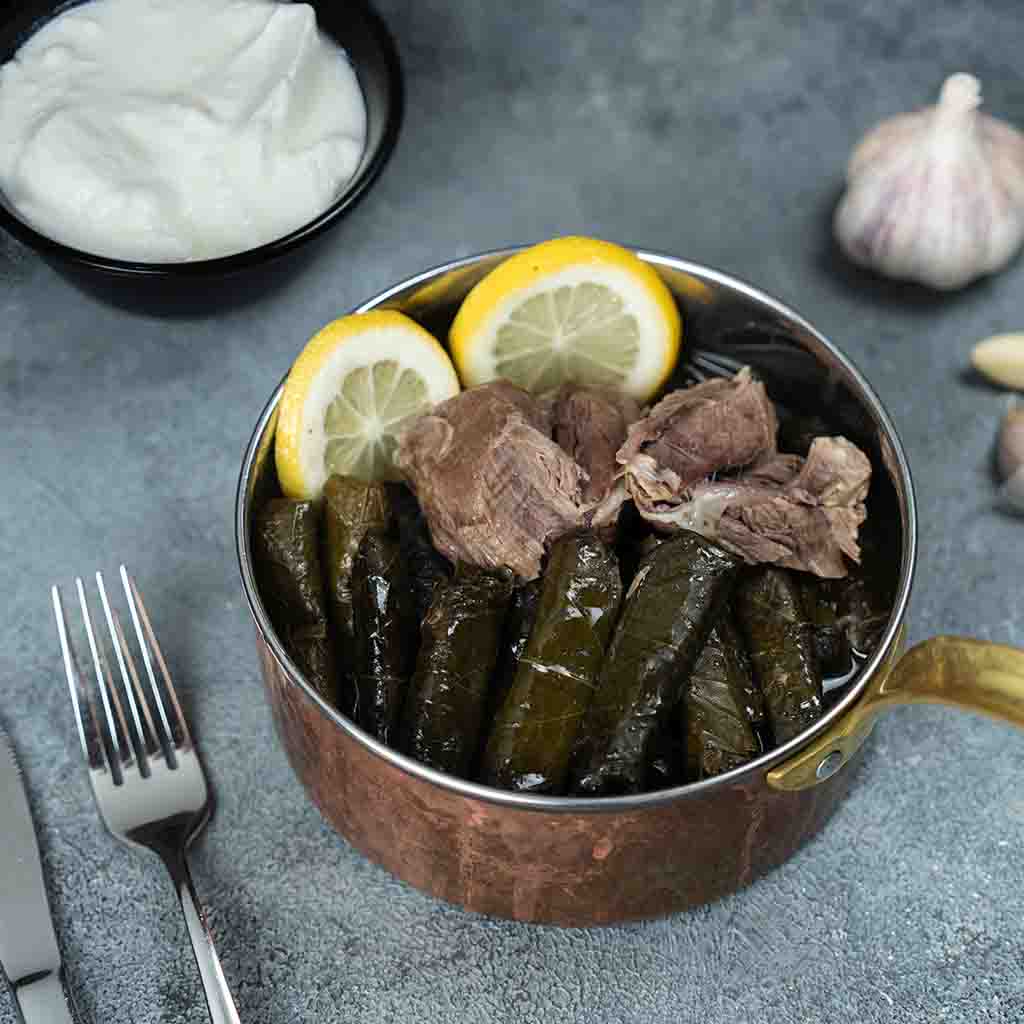 Grape leaves with lamb legs