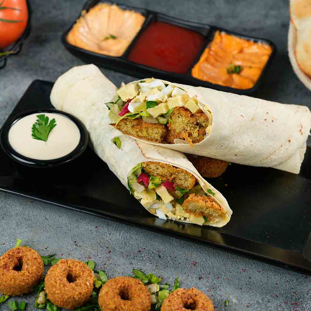Saj falafel with eggs, chickpeas and cheese