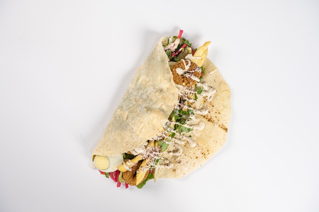 sandwich falafel shamiyah with eggs and hummus