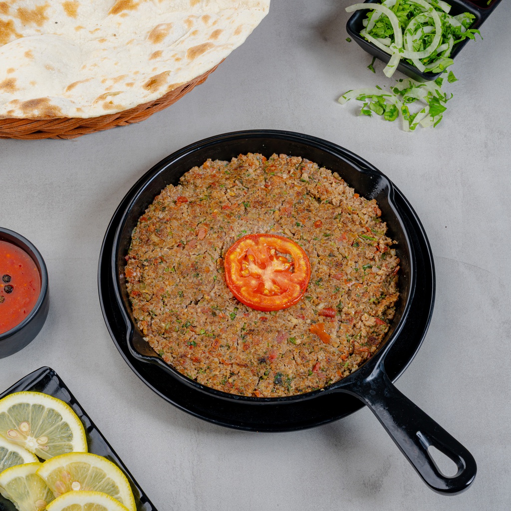 Meat kofta with tomatoes