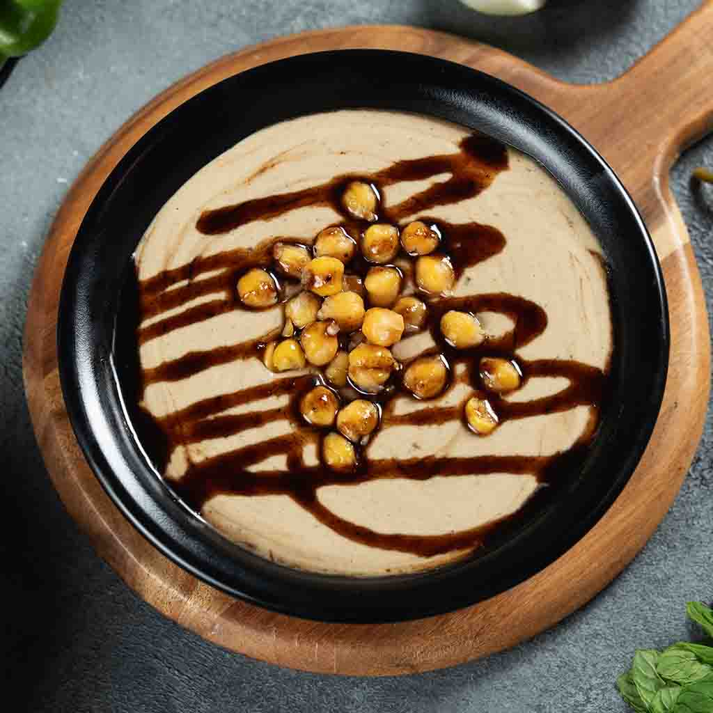 Hummus with pomegranate sauce