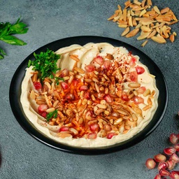 Hummus with ghee and pine nuts