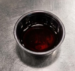 Pomegranate molasses container